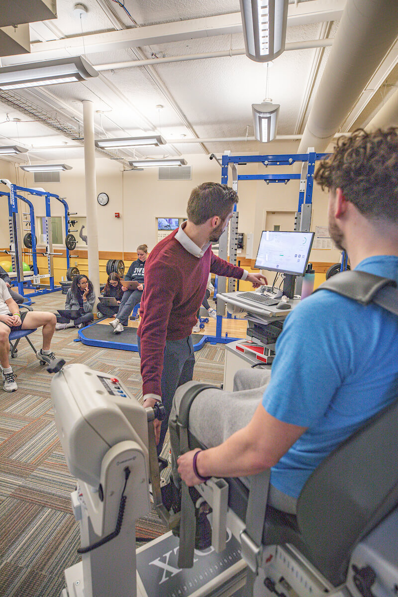 student used biodex machine in exercise science lab