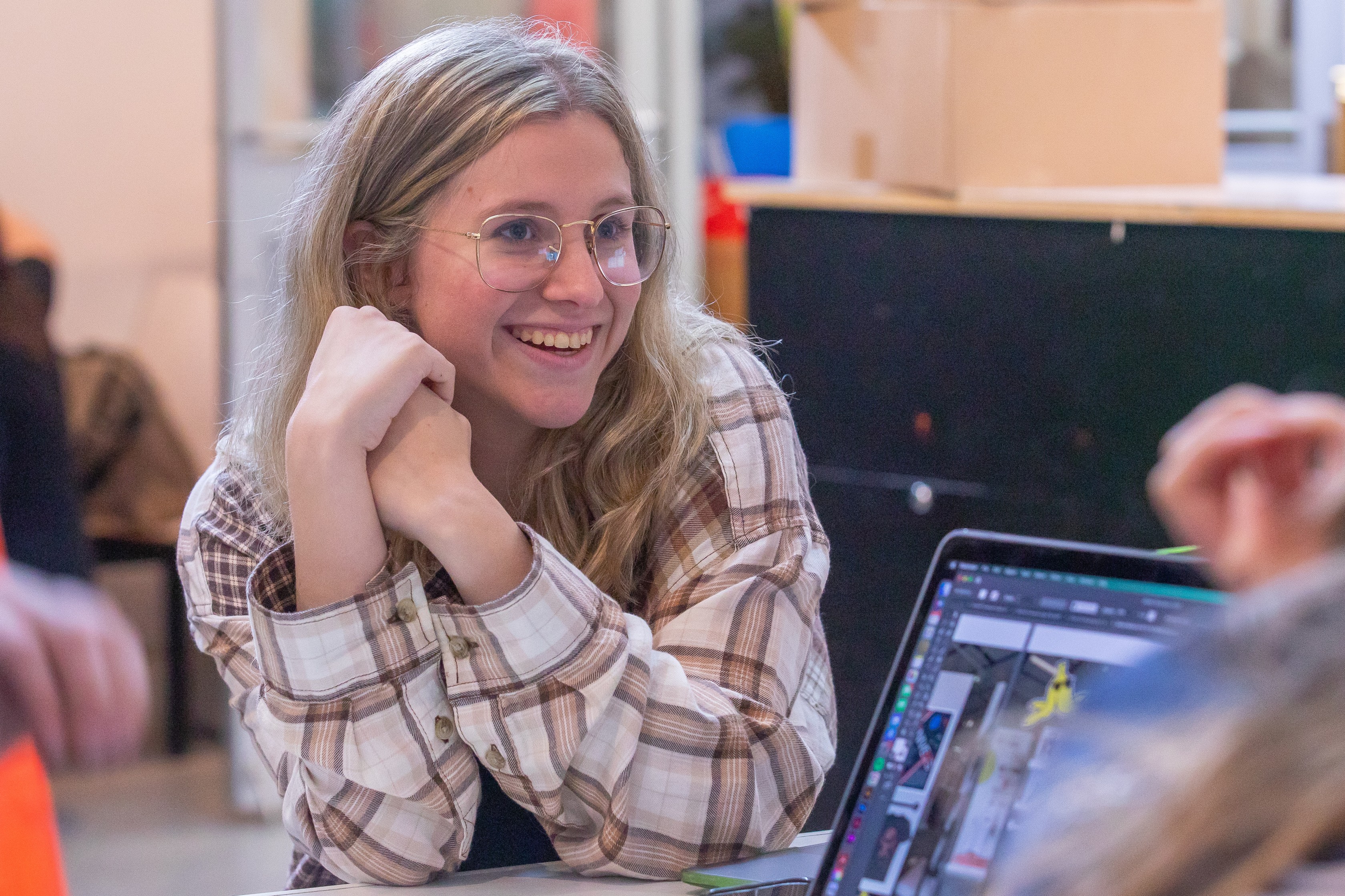 student smiling in class