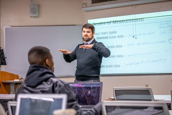 JWU professor teaching classroom
