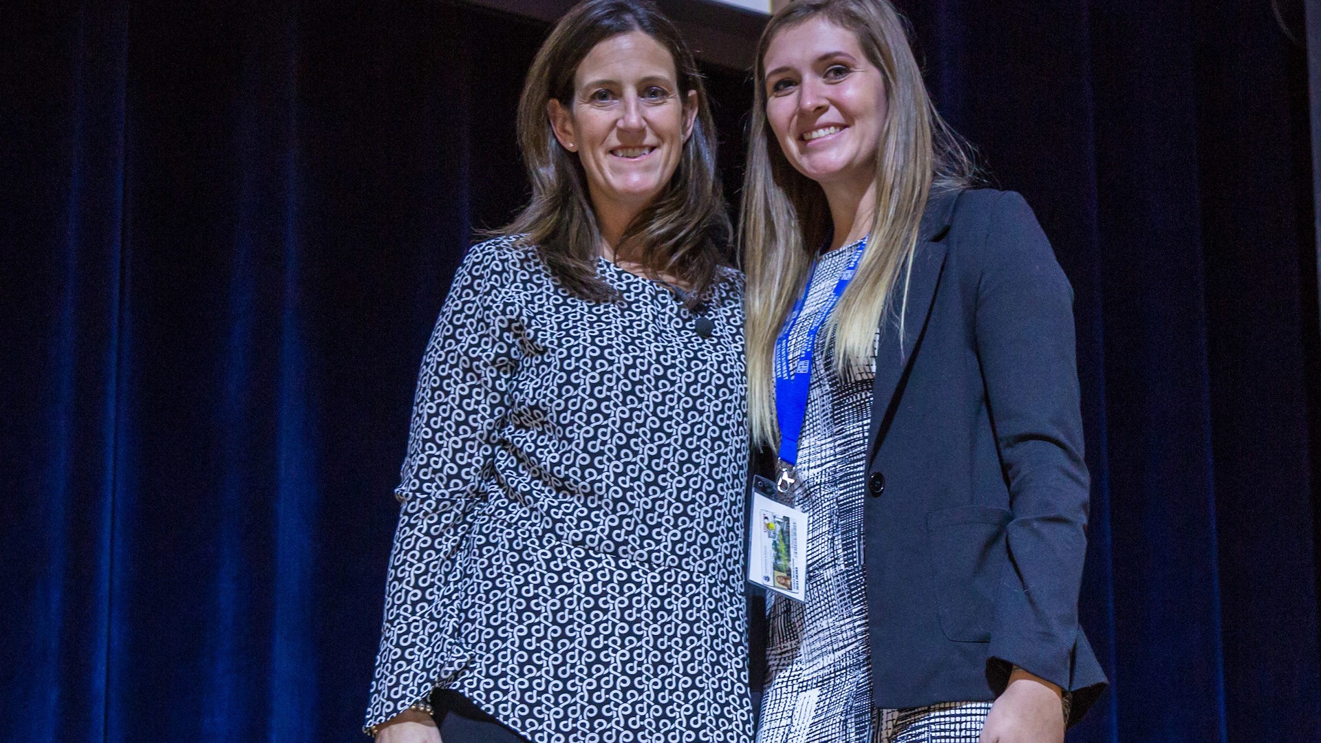 Student Aralyse Johnson with speaker Jennifer Ferron, vice president of marketing & brand development, Kraft Sports & Entertainment Group with student