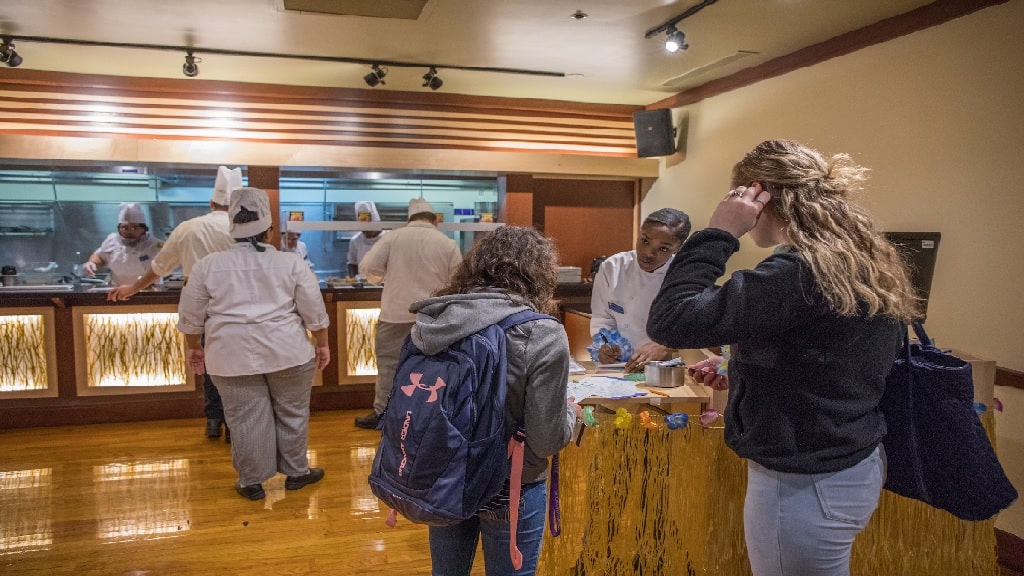 students signing in the culinary experience