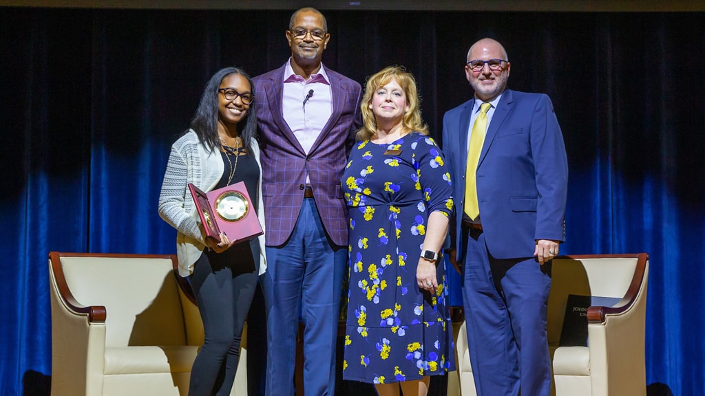 VIP Scholarship Winner Kayla Gayle '22, VIP speaker Chip Wade '83, '86 Hon., Interim Dean Jennifer Galipeau, Richard Wiscott