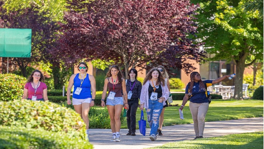 orientation group walking outside while getting a tour