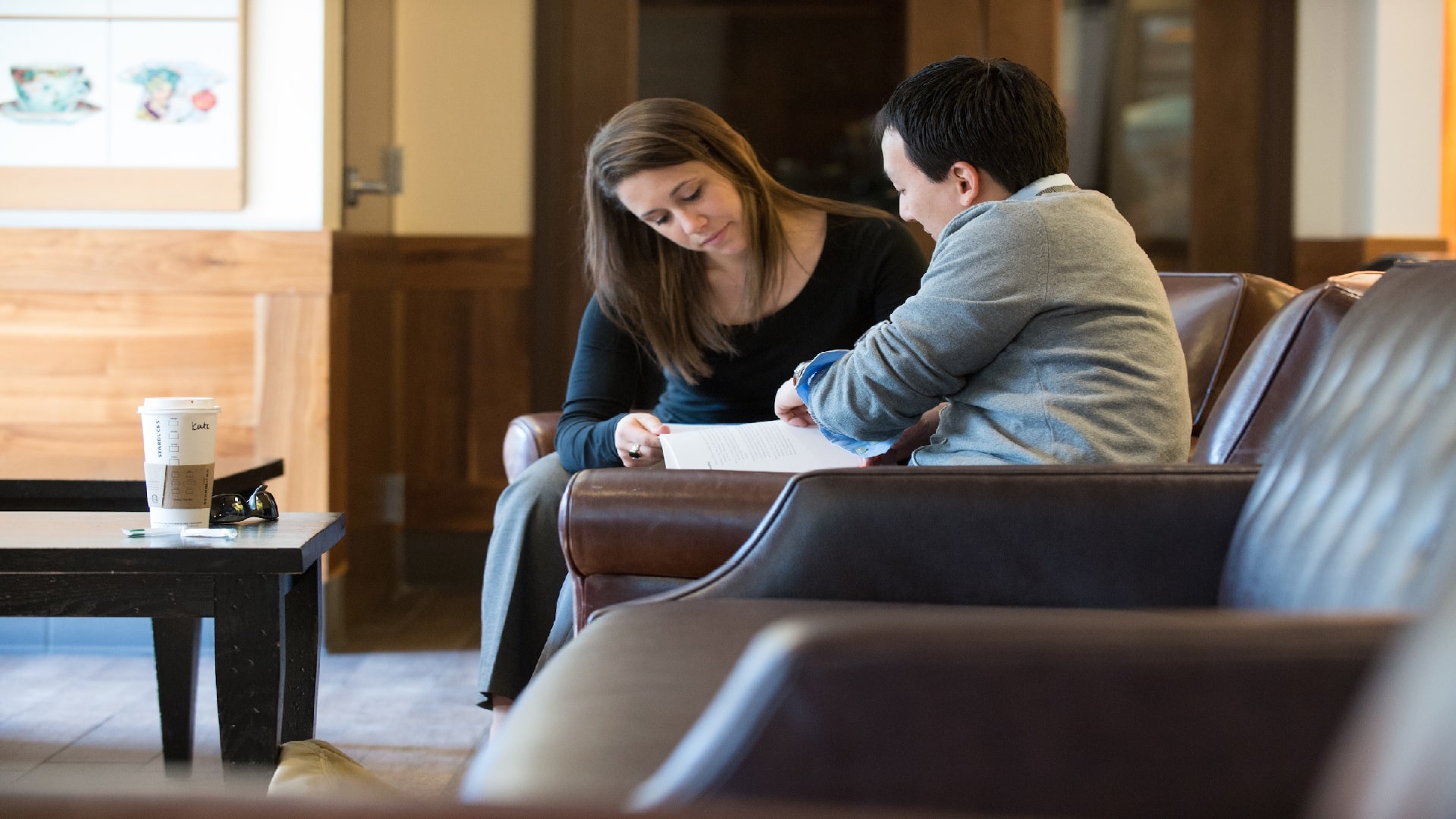 Professor talking with a student