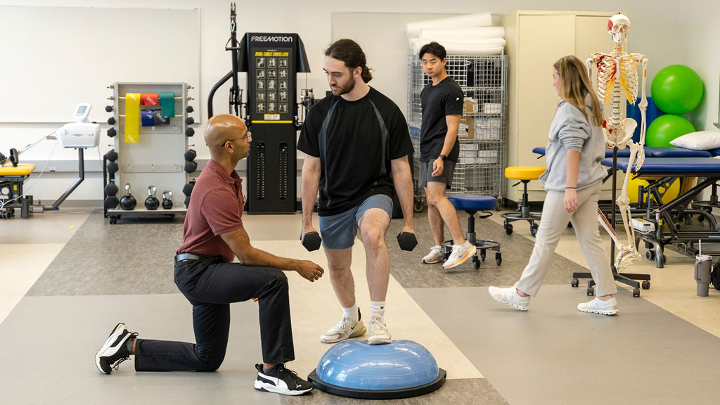 PT students Siddharth Koka '27 and Anthony Lancellotti '27 practicing exercises for balance.