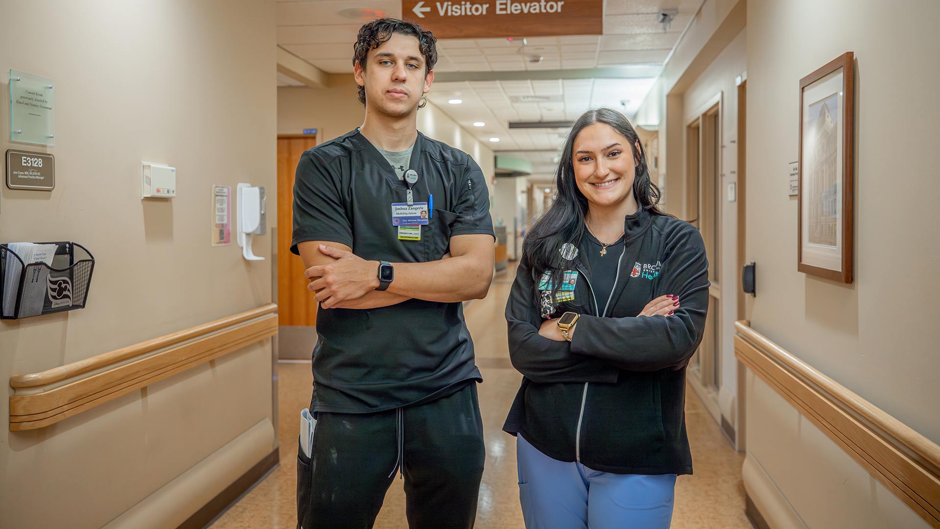 Josh Zangerle '25 and Aria Coutu '26 pose at their hospital internship